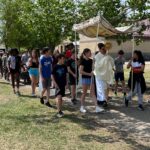 École St. Mother Teresa students walking in the Eucharistic procession