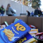 a large bin of food collected by students for Saskatoon Food Bank and Learning Center during the annual Halloweening for Hunger food drive
