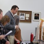 Fr. Penna (left) leads a commissioning service for trustees at the Organization Meeting of GSCS Board of Education