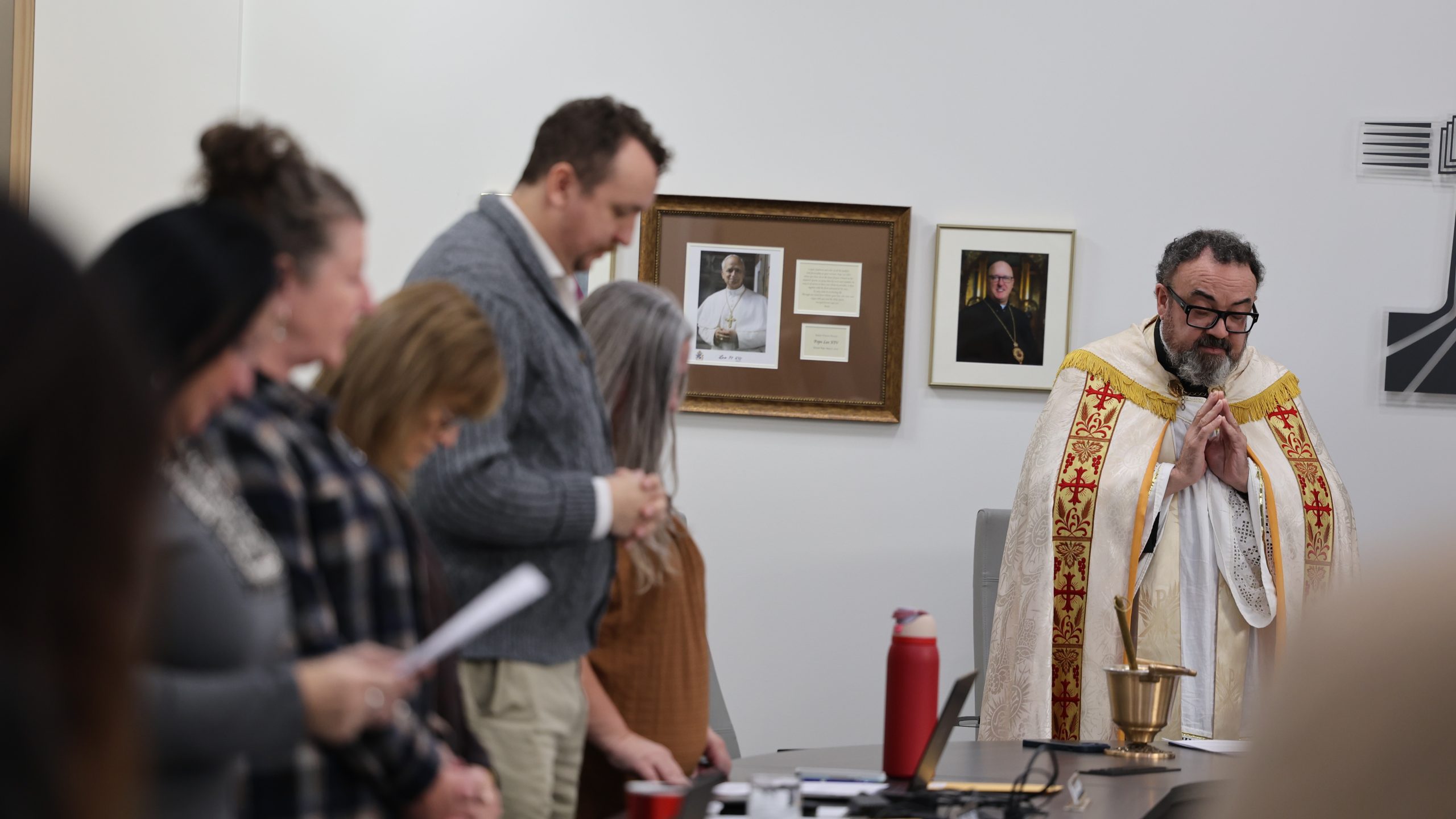 6W0A8512.jpg Fr. Penna (left) leads a commissioning service for trustees at the Organization Meeting of GSCS Board of Education
