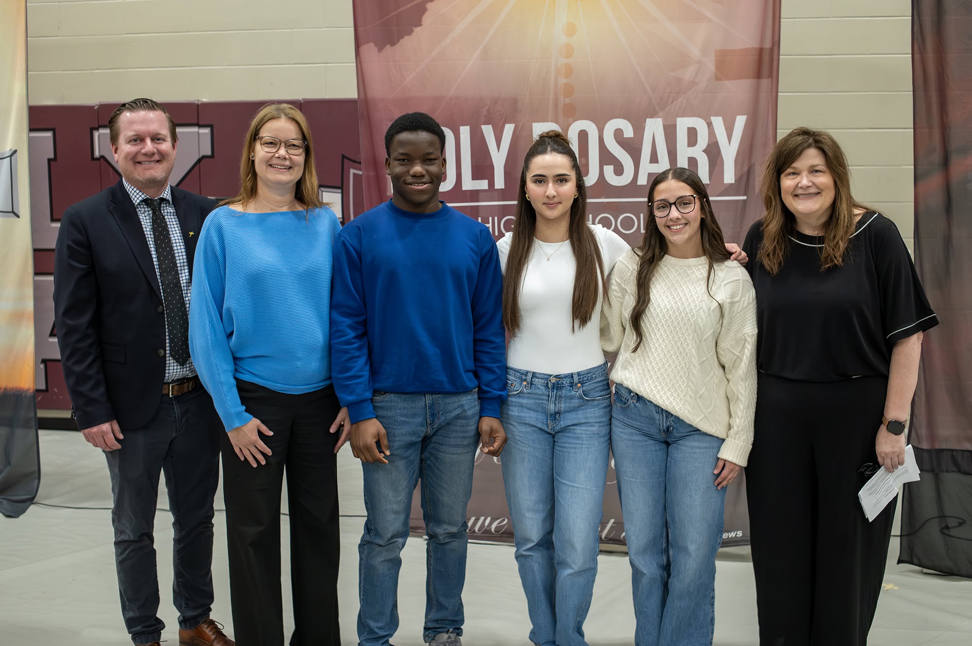Lloydminster seniors among first recipients of a provincial Catholic leadership honour Holy Rosary High School award recipients with division leaders